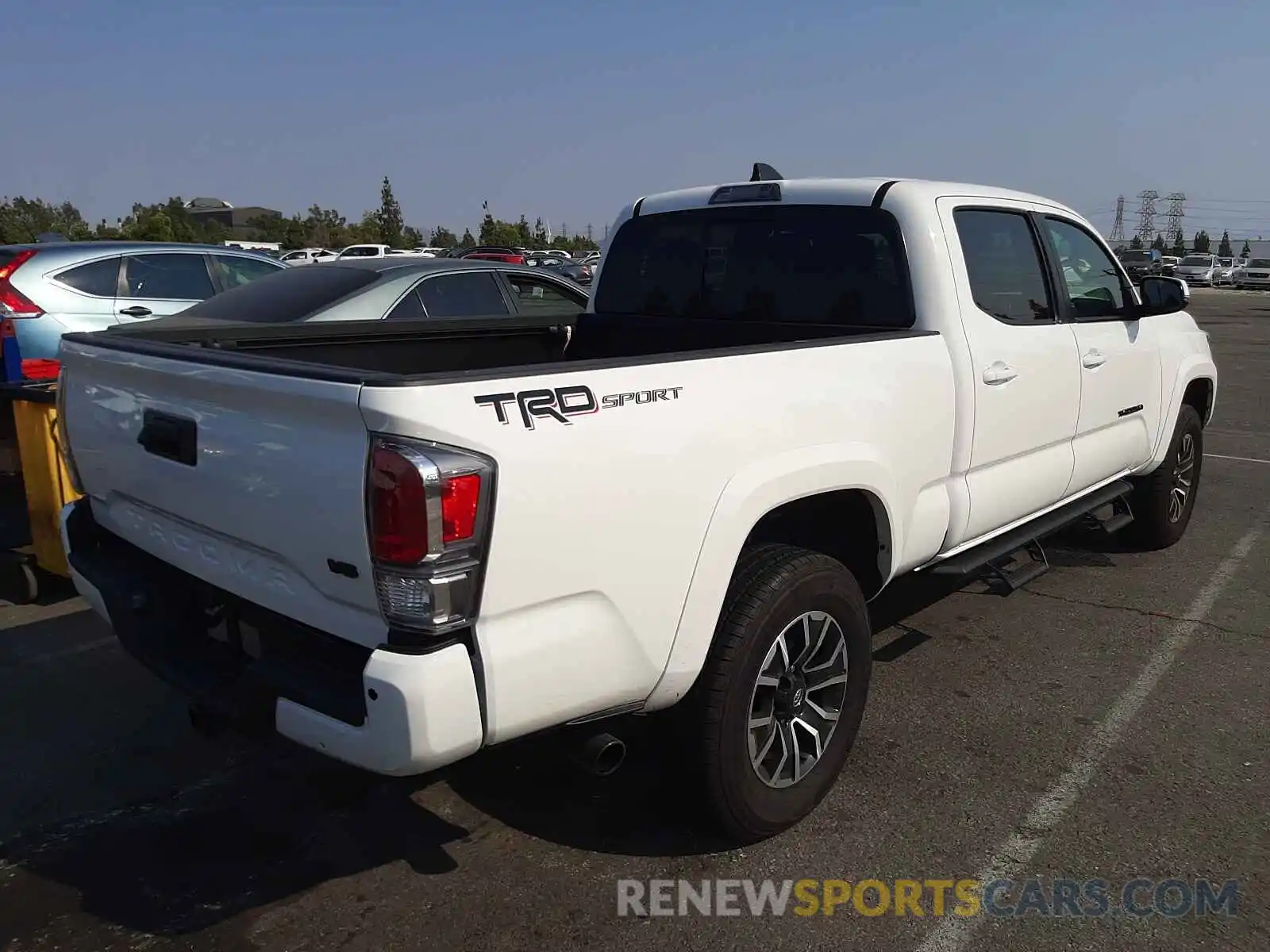 4 Photograph of a damaged car 3TMBZ5DN3MM030808 TOYOTA TACOMA 2021