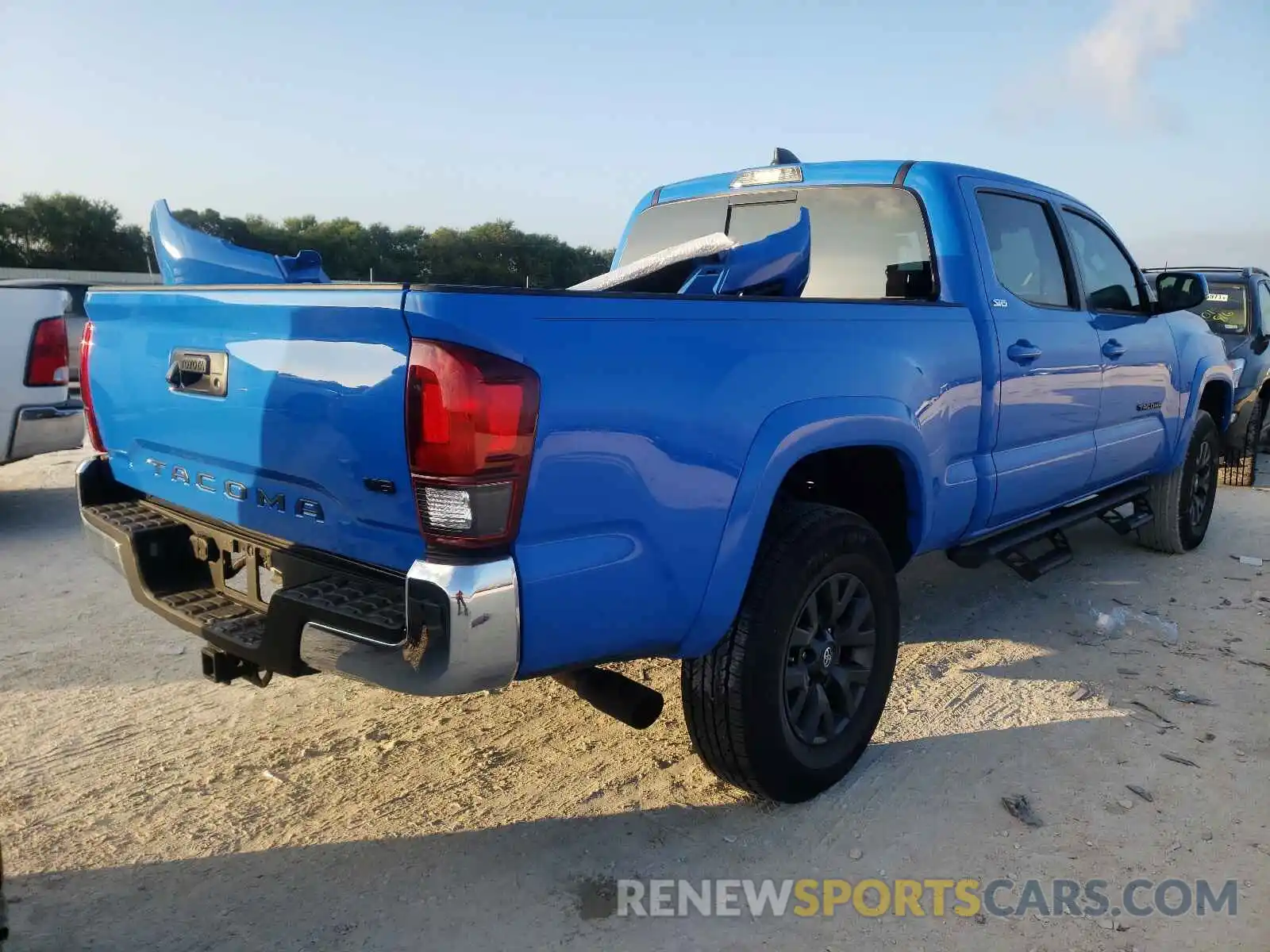 4 Photograph of a damaged car 3TMBZ5DN7MM028995 TOYOTA TACOMA 2021