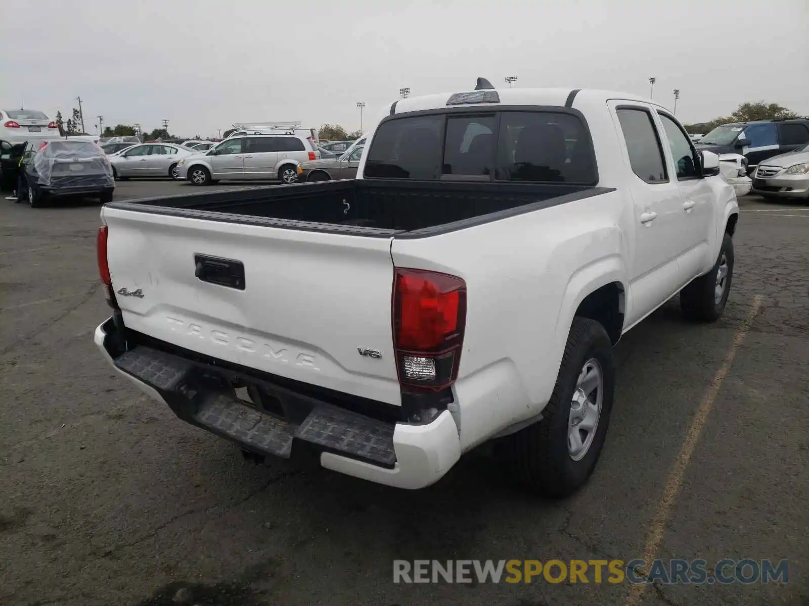 4 Photograph of a damaged car 3TMCZ5AN0MM401836 TOYOTA TACOMA 2021