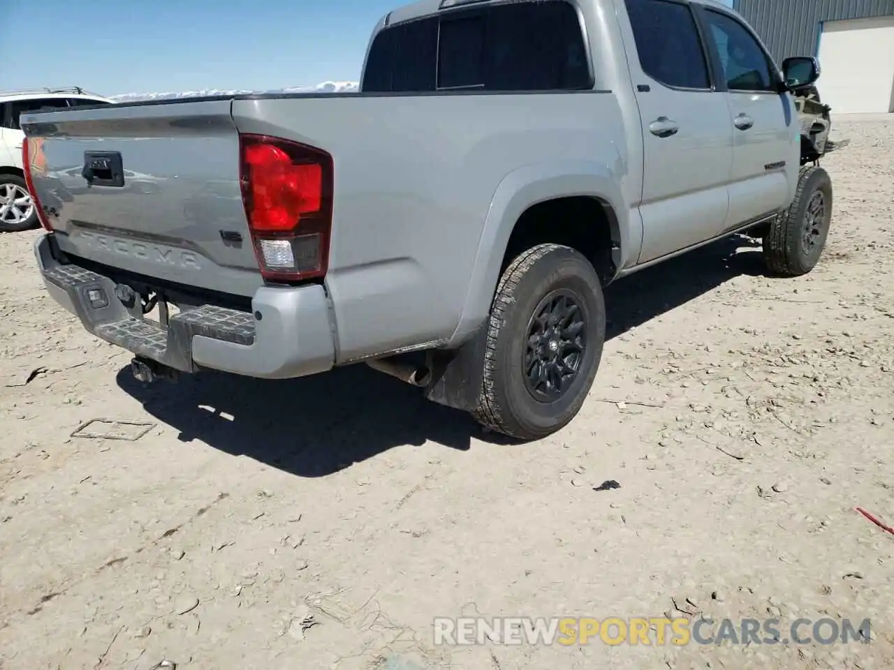 4 Photograph of a damaged car 3TMCZ5AN2MM394856 TOYOTA TACOMA 2021