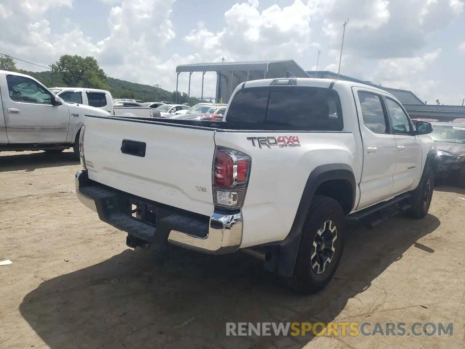 4 Photograph of a damaged car 3TMCZ5AN3MM399452 TOYOTA TACOMA 2021