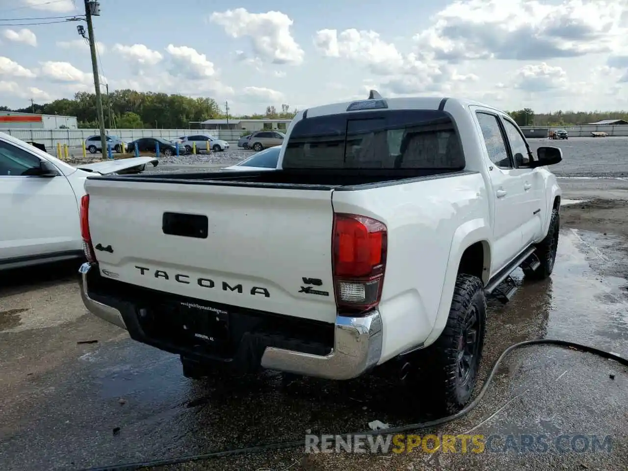 4 Photograph of a damaged car 3TMCZ5AN3MM413544 TOYOTA TACOMA 2021