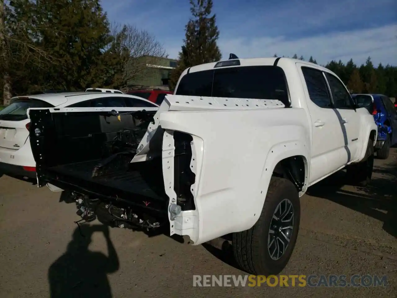 4 Photograph of a damaged car 3TMCZ5AN3MM429730 TOYOTA TACOMA 2021