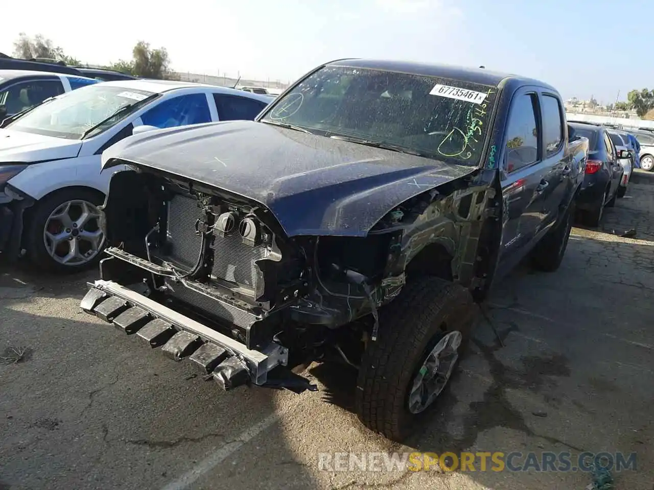 2 Photograph of a damaged car 3TMCZ5AN3MM450755 TOYOTA TACOMA 2021