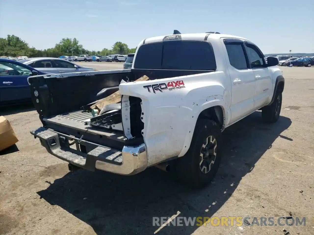 4 Photograph of a damaged car 3TMCZ5AN4MM395006 TOYOTA TACOMA 2021