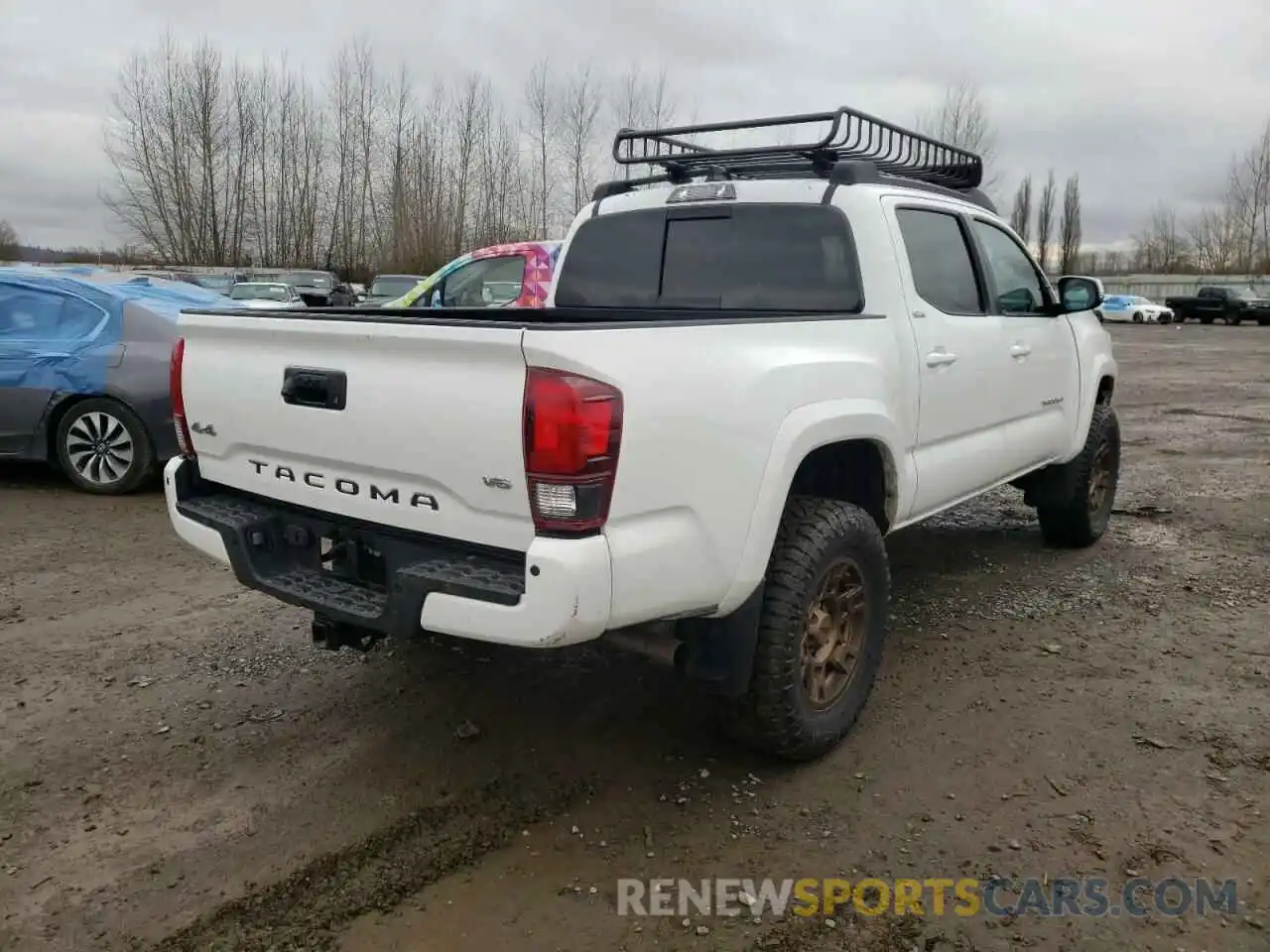 4 Photograph of a damaged car 3TMCZ5AN4MM395992 TOYOTA TACOMA 2021