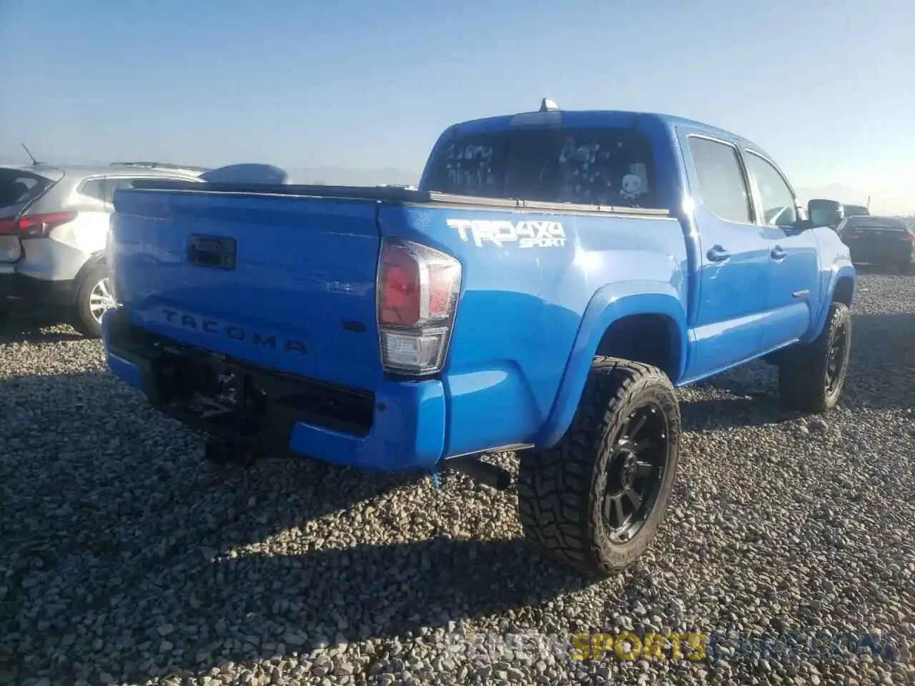 4 Photograph of a damaged car 3TMCZ5AN4MM429512 TOYOTA TACOMA 2021