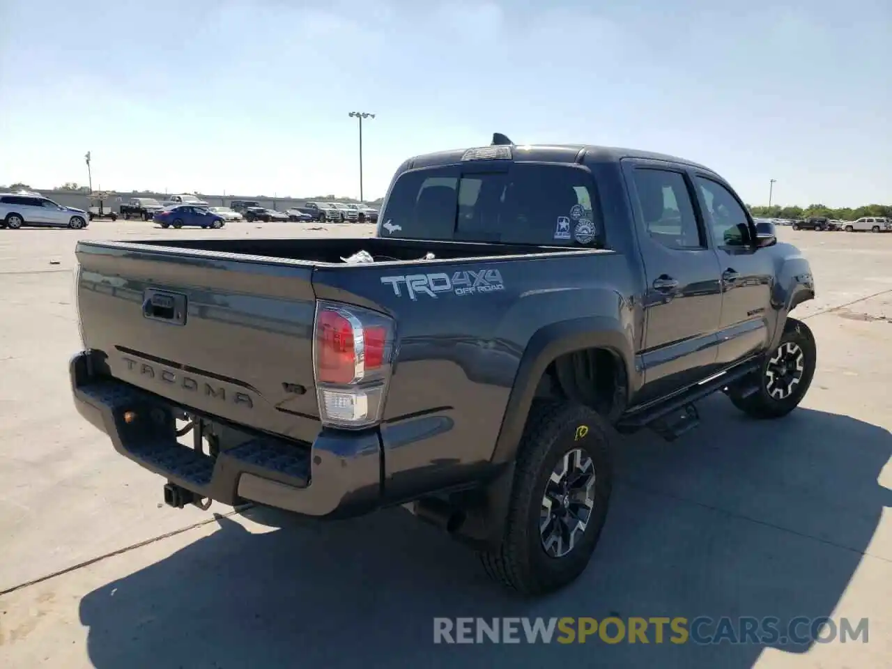 4 Photograph of a damaged car 3TMCZ5AN4MM435729 TOYOTA TACOMA 2021