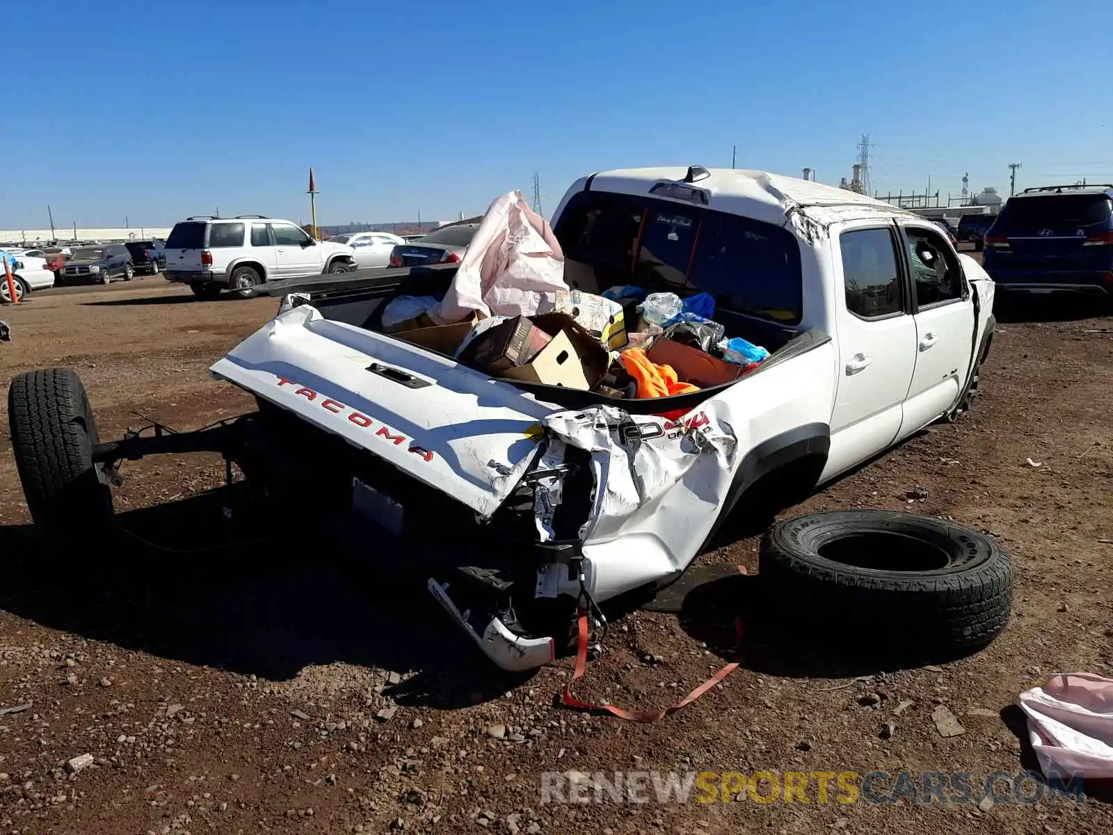 4 Photograph of a damaged car 3TMCZ5AN4MM446939 TOYOTA TACOMA 2021