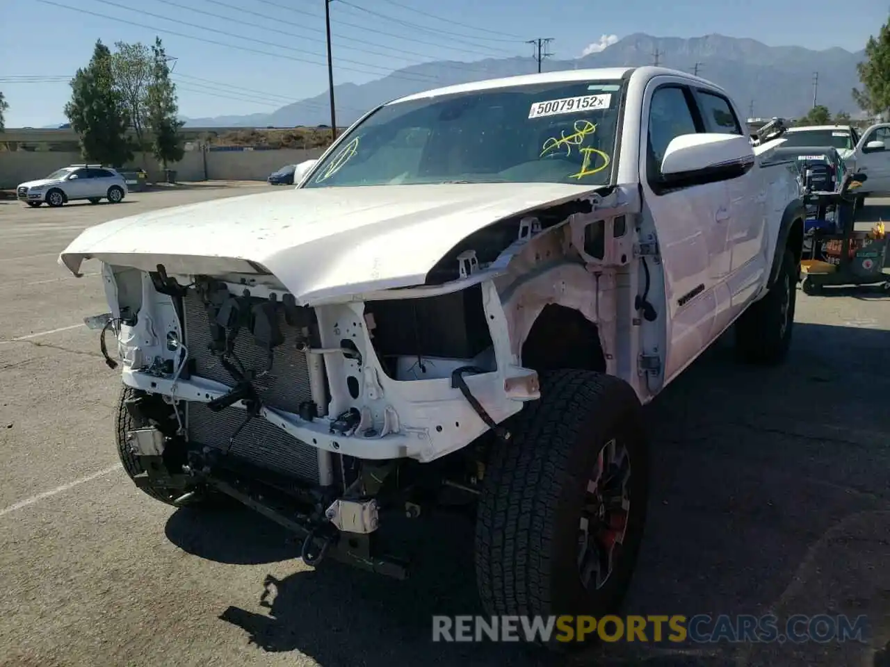 2 Photograph of a damaged car 3TMCZ5AN5MM374763 TOYOTA TACOMA 2021