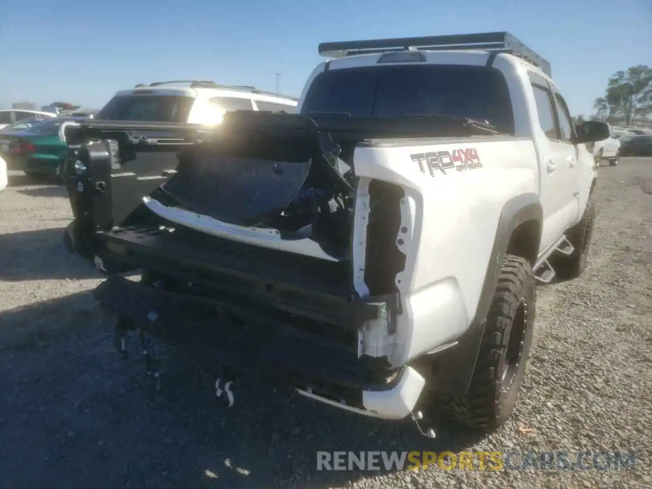 4 Photograph of a damaged car 3TMCZ5AN5MM388906 TOYOTA TACOMA 2021