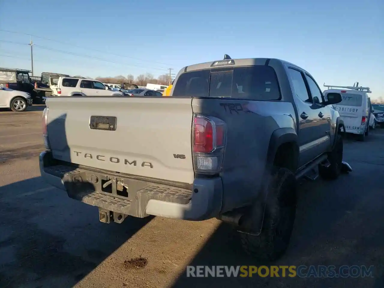 4 Photograph of a damaged car 3TMCZ5AN5MM409379 TOYOTA TACOMA 2021