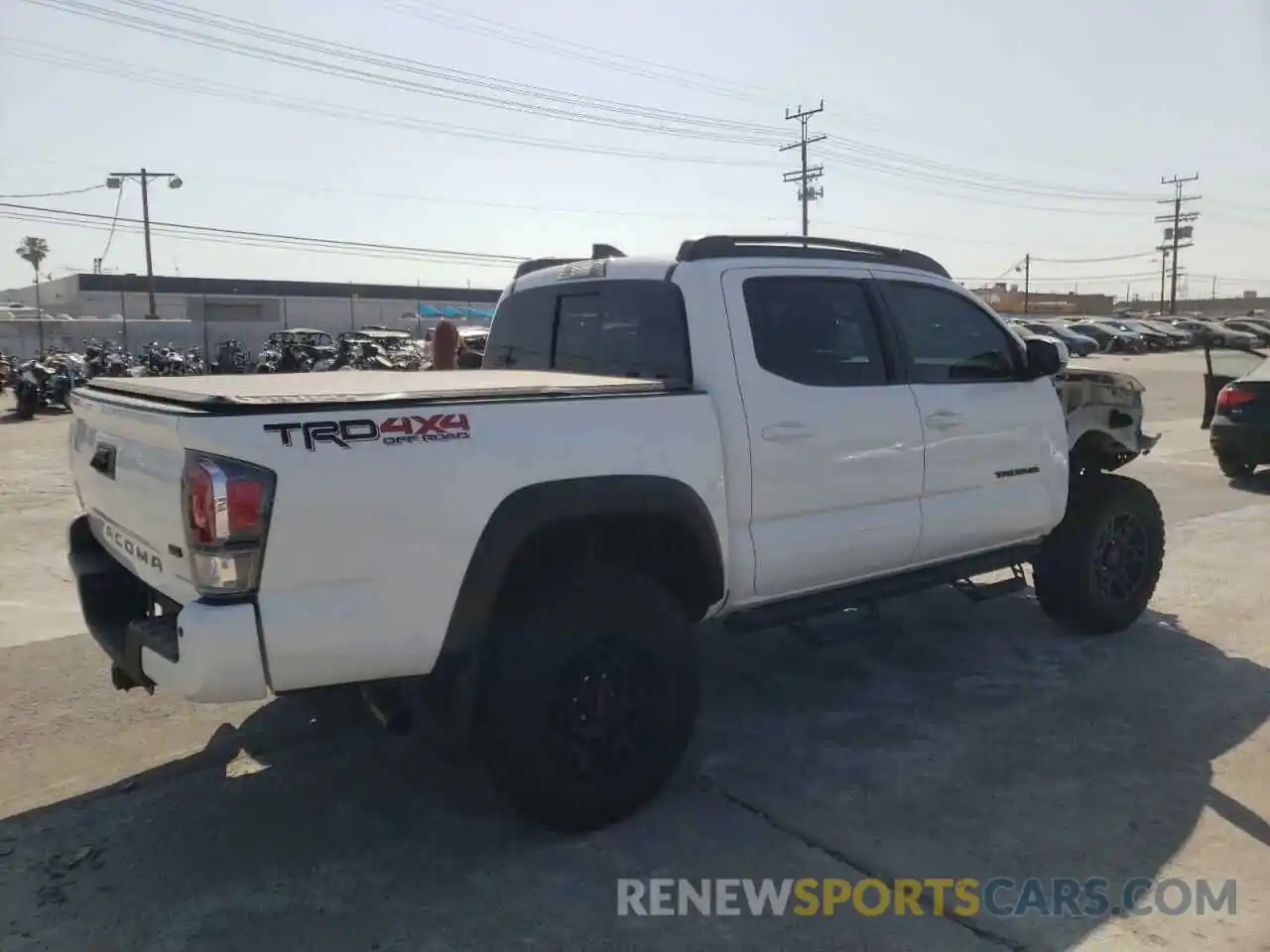 4 Photograph of a damaged car 3TMCZ5AN5MM443046 TOYOTA TACOMA 2021