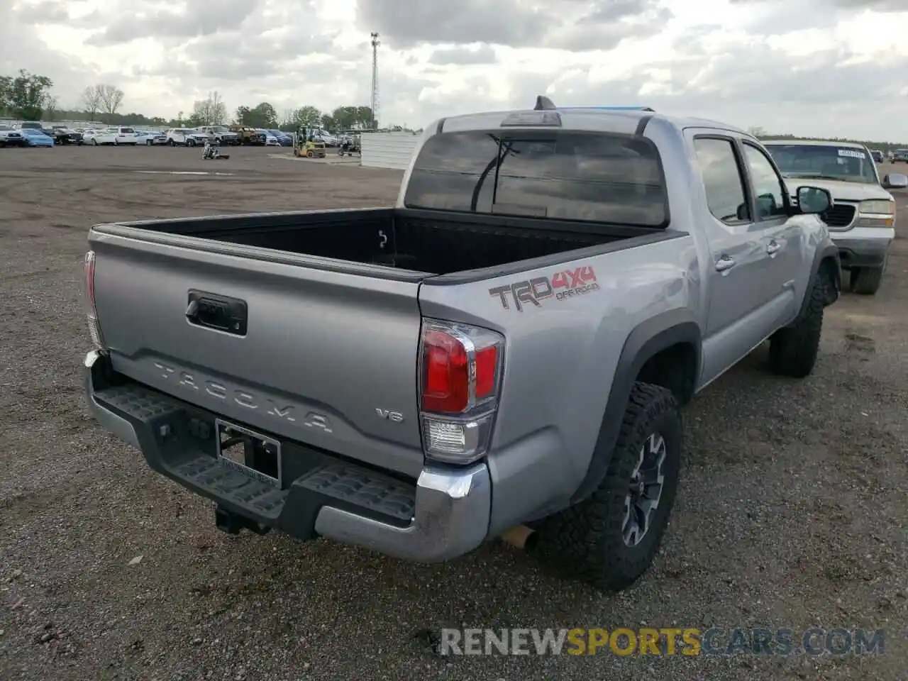 4 Photograph of a damaged car 3TMCZ5AN6MM394326 TOYOTA TACOMA 2021