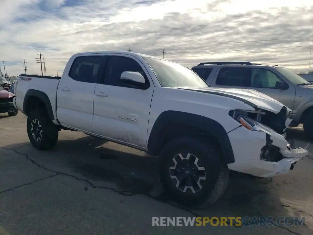 4 Photograph of a damaged car 3TMCZ5AN6MM406054 TOYOTA TACOMA 2021