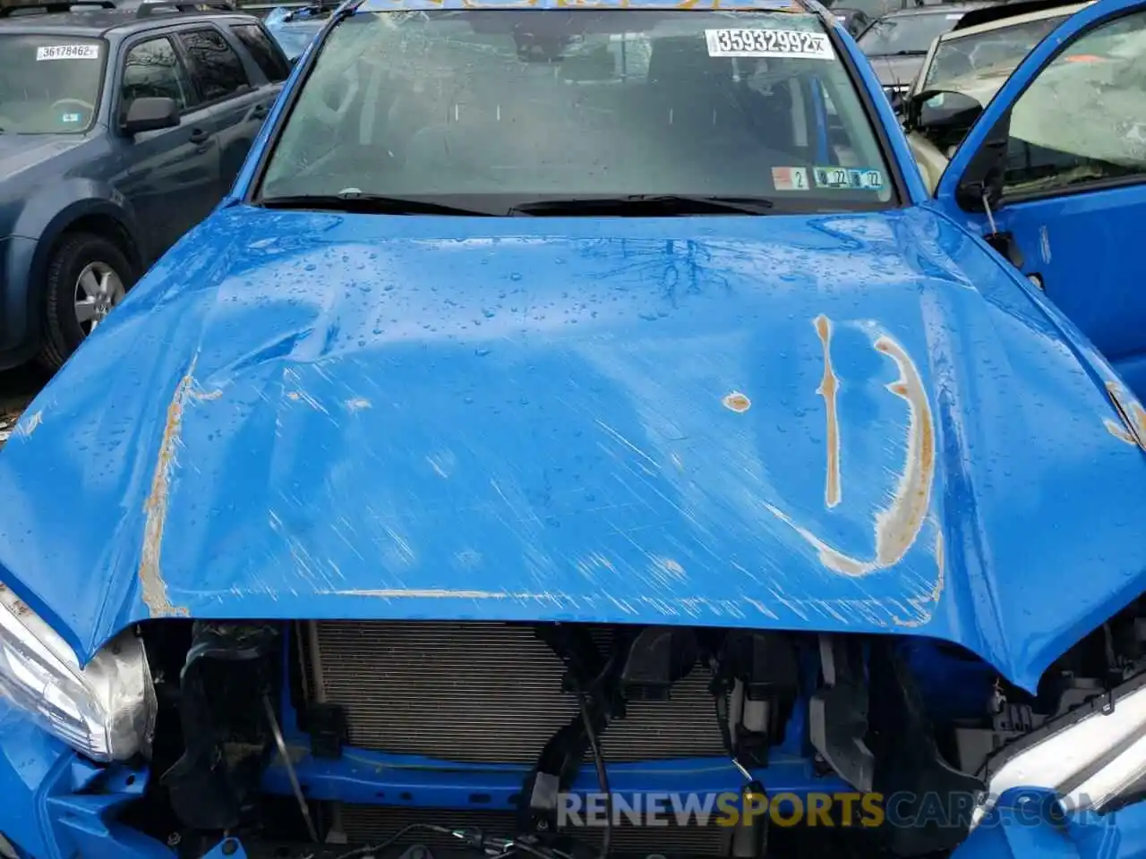 7 Photograph of a damaged car 3TMCZ5AN6MM409391 TOYOTA TACOMA 2021