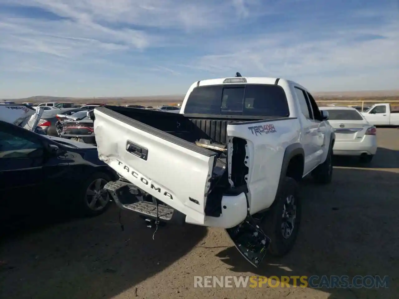 4 Photograph of a damaged car 3TMCZ5AN6MM438938 TOYOTA TACOMA 2021