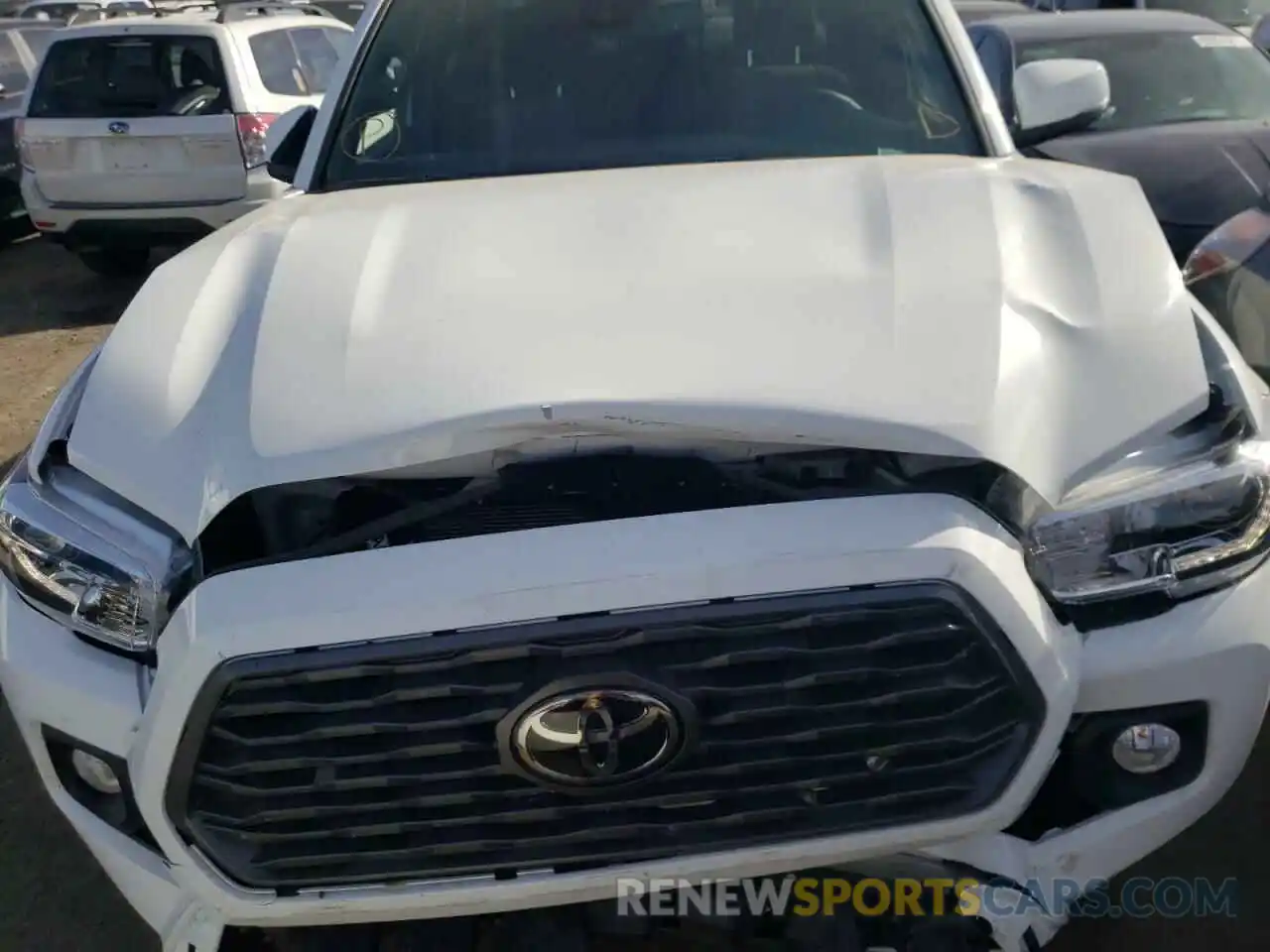 7 Photograph of a damaged car 3TMCZ5AN6MM438938 TOYOTA TACOMA 2021