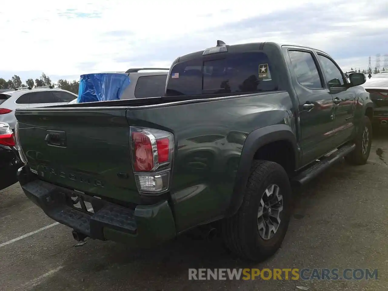 4 Photograph of a damaged car 3TMCZ5AN8MM393193 TOYOTA TACOMA 2021