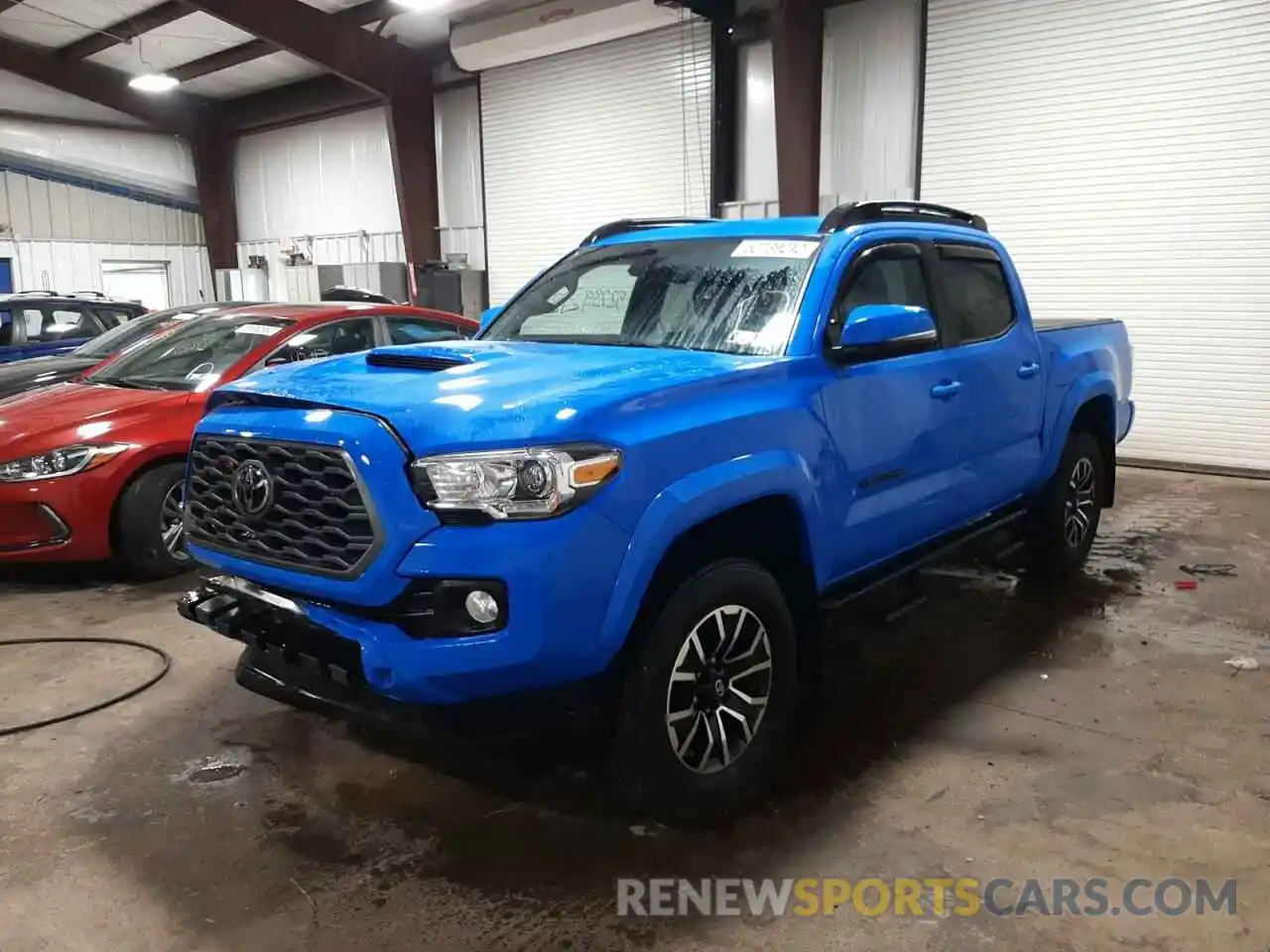 2 Photograph of a damaged car 3TMCZ5AN8MM394327 TOYOTA TACOMA 2021