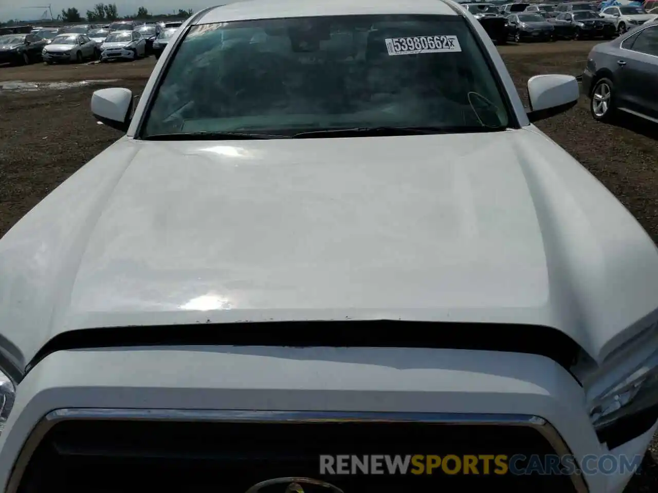 7 Photograph of a damaged car 3TMCZ5AN9MM380999 TOYOTA TACOMA 2021