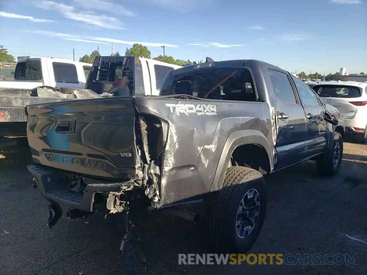 4 Photograph of a damaged car 3TMCZ5AN9MM402354 TOYOTA TACOMA 2021