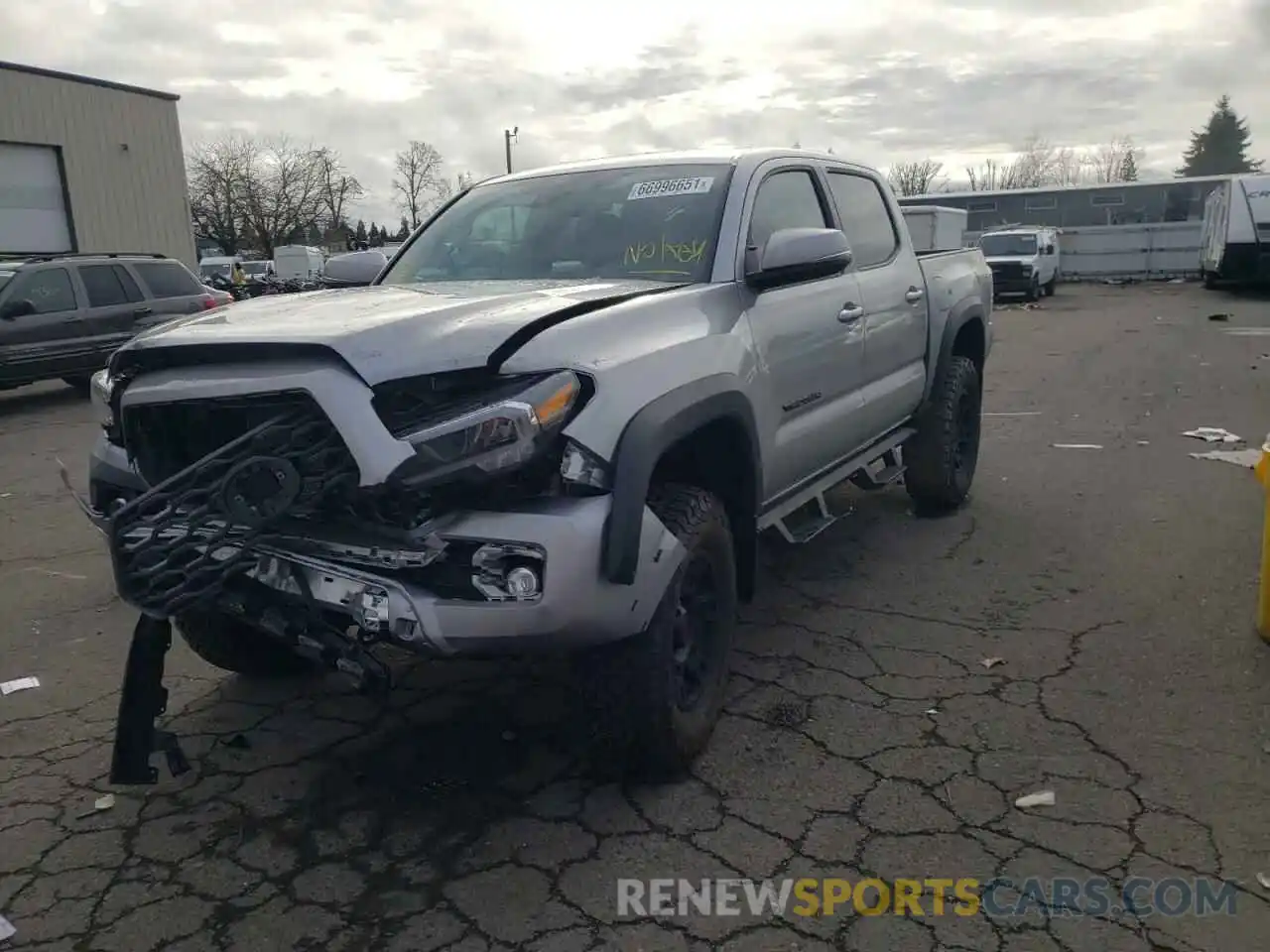 2 Photograph of a damaged car 3TMCZ5AN9MM409398 TOYOTA TACOMA 2021