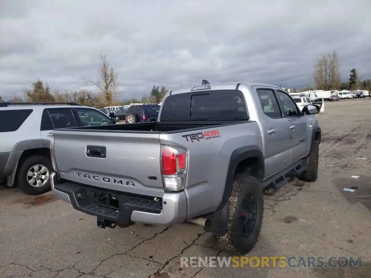 4 Photograph of a damaged car 3TMCZ5AN9MM409398 TOYOTA TACOMA 2021