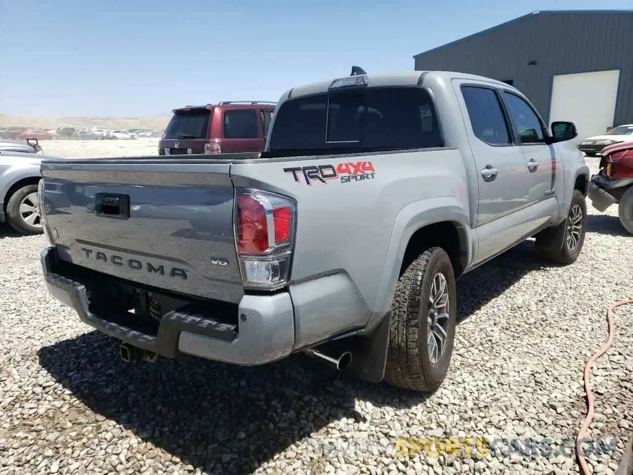 4 Photograph of a damaged car 3TMCZ5AN9MM434821 TOYOTA TACOMA 2021