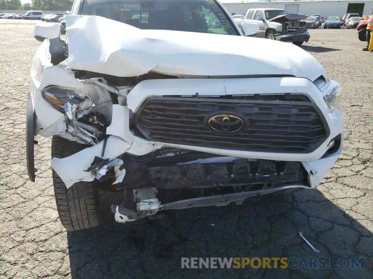 9 Photograph of a damaged car 3TMDZ5BN2MM100794 TOYOTA TACOMA 2021