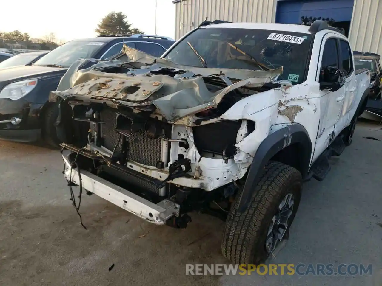 2 Photograph of a damaged car 3TMDZ5BN7MM098704 TOYOTA TACOMA 2021