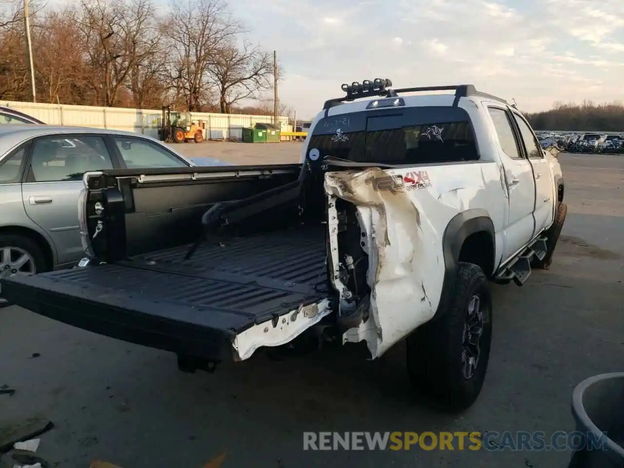 4 Photograph of a damaged car 3TMDZ5BN7MM098704 TOYOTA TACOMA 2021