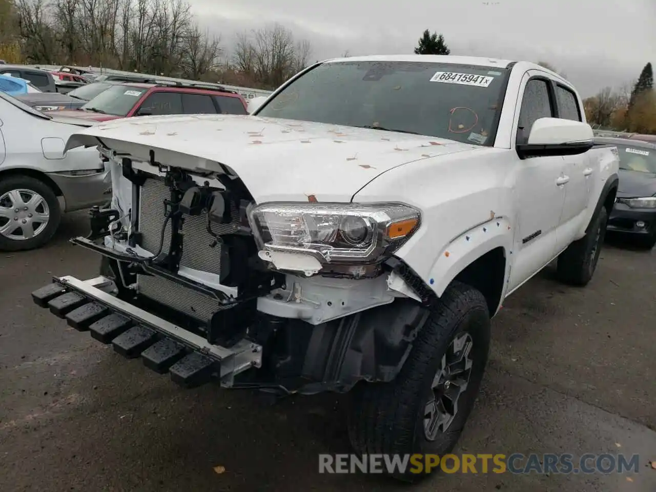 2 Photograph of a damaged car 3TMDZ5BN7MM112343 TOYOTA TACOMA 2021