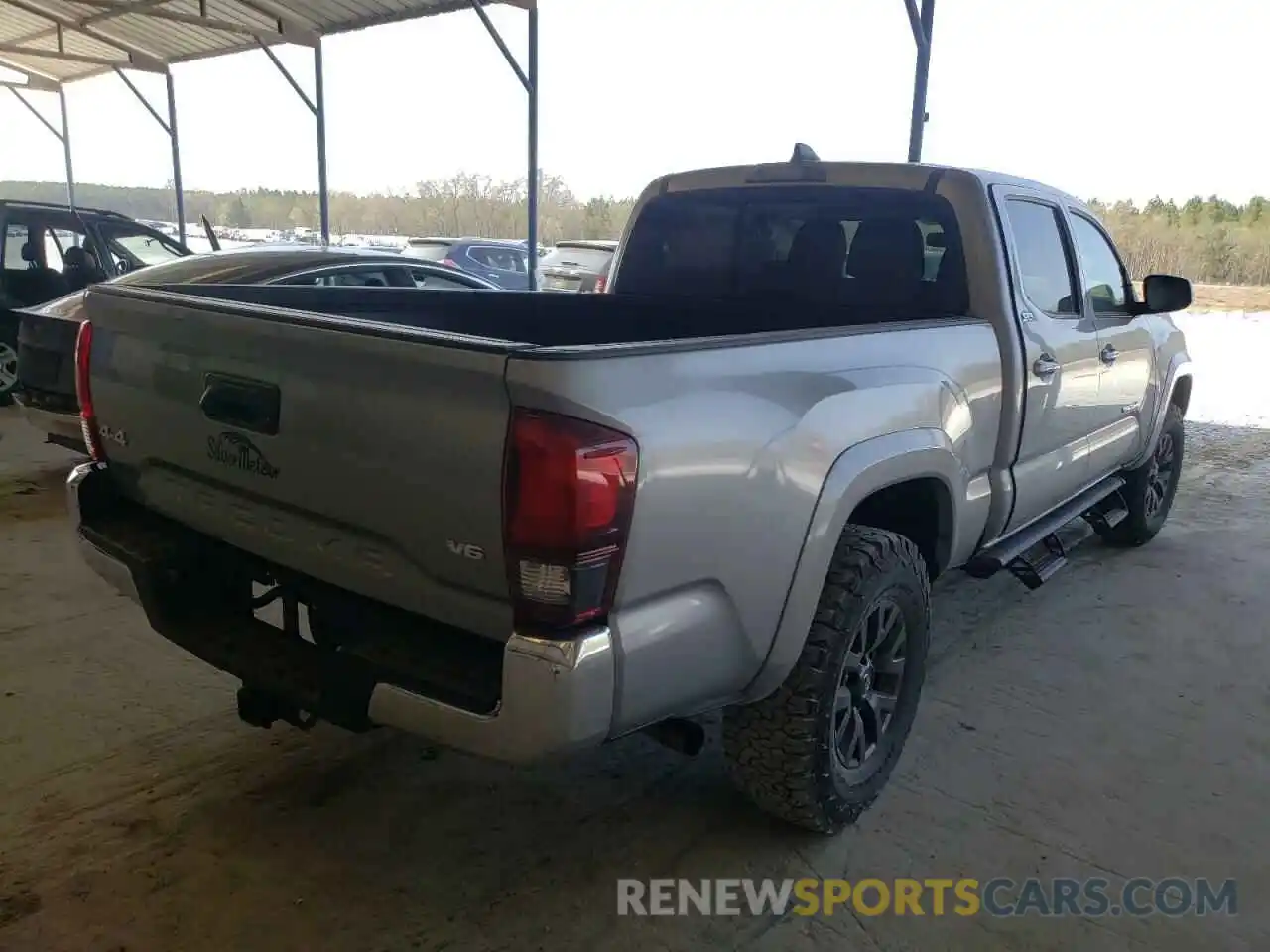 4 Photograph of a damaged car 3TMDZ5BNXMM109999 TOYOTA TACOMA 2021