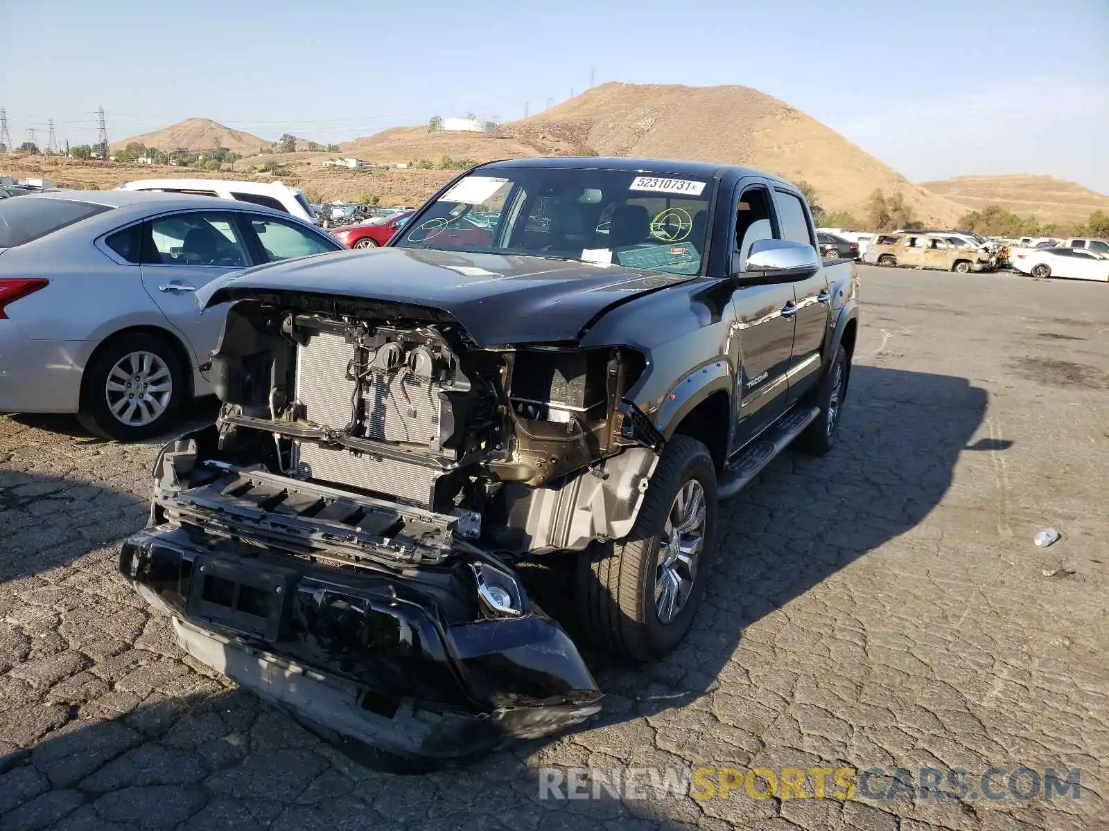 2 Photograph of a damaged car 3TMGZ5AN2MM371885 TOYOTA TACOMA 2021