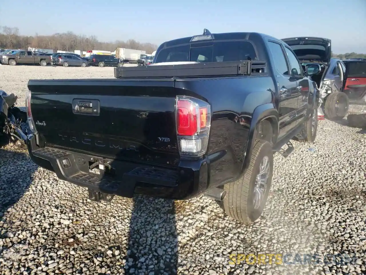 4 Photograph of a damaged car 3TMGZ5AN4MM386047 TOYOTA TACOMA 2021