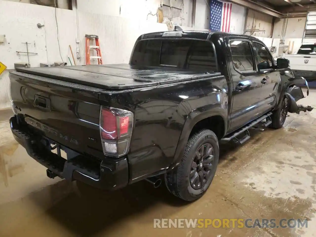 4 Photograph of a damaged car 3TMGZ5AN6MM401650 TOYOTA TACOMA 2021