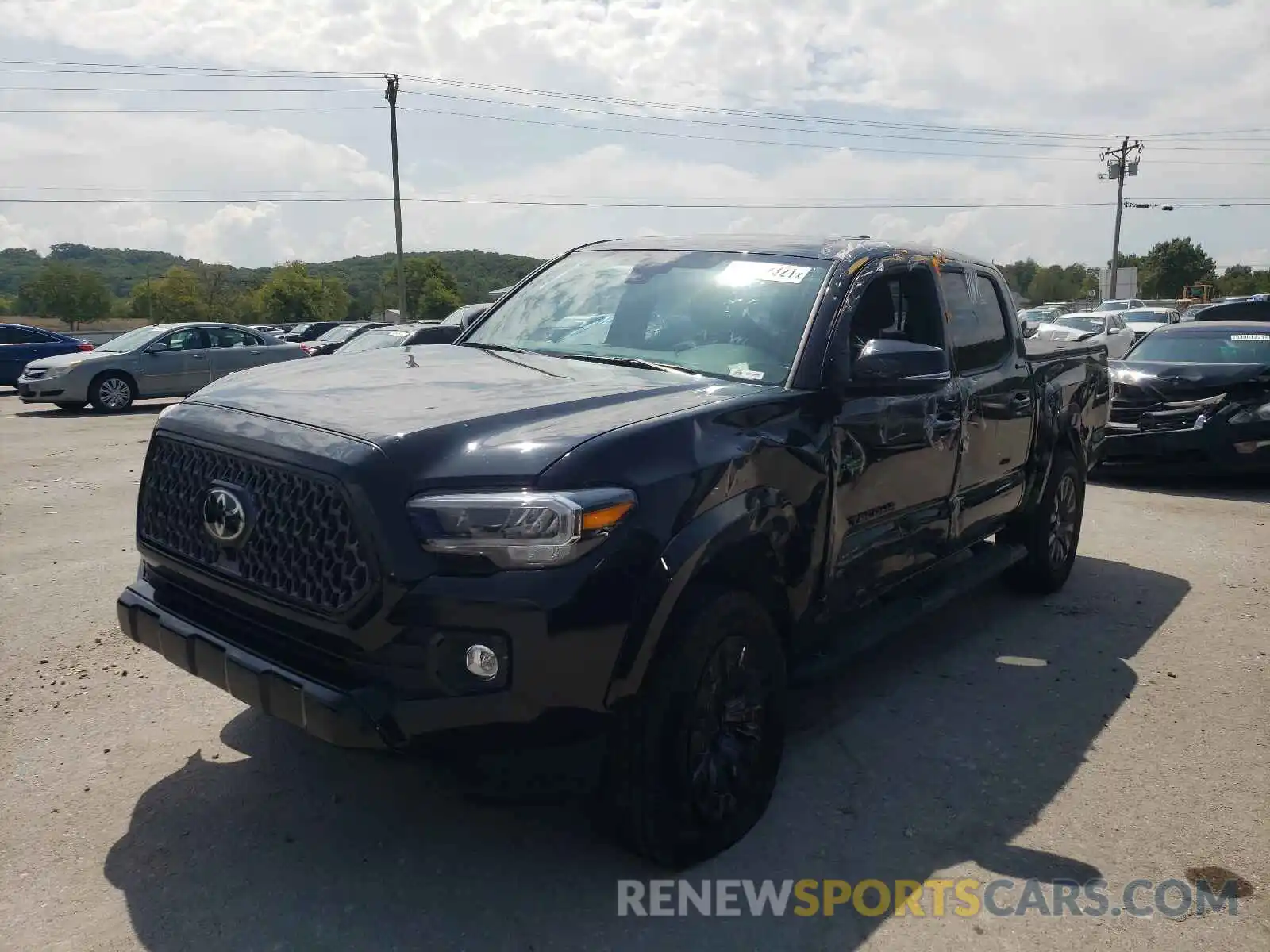 2 Photograph of a damaged car 3TMGZ5AN7MM371817 TOYOTA TACOMA 2021