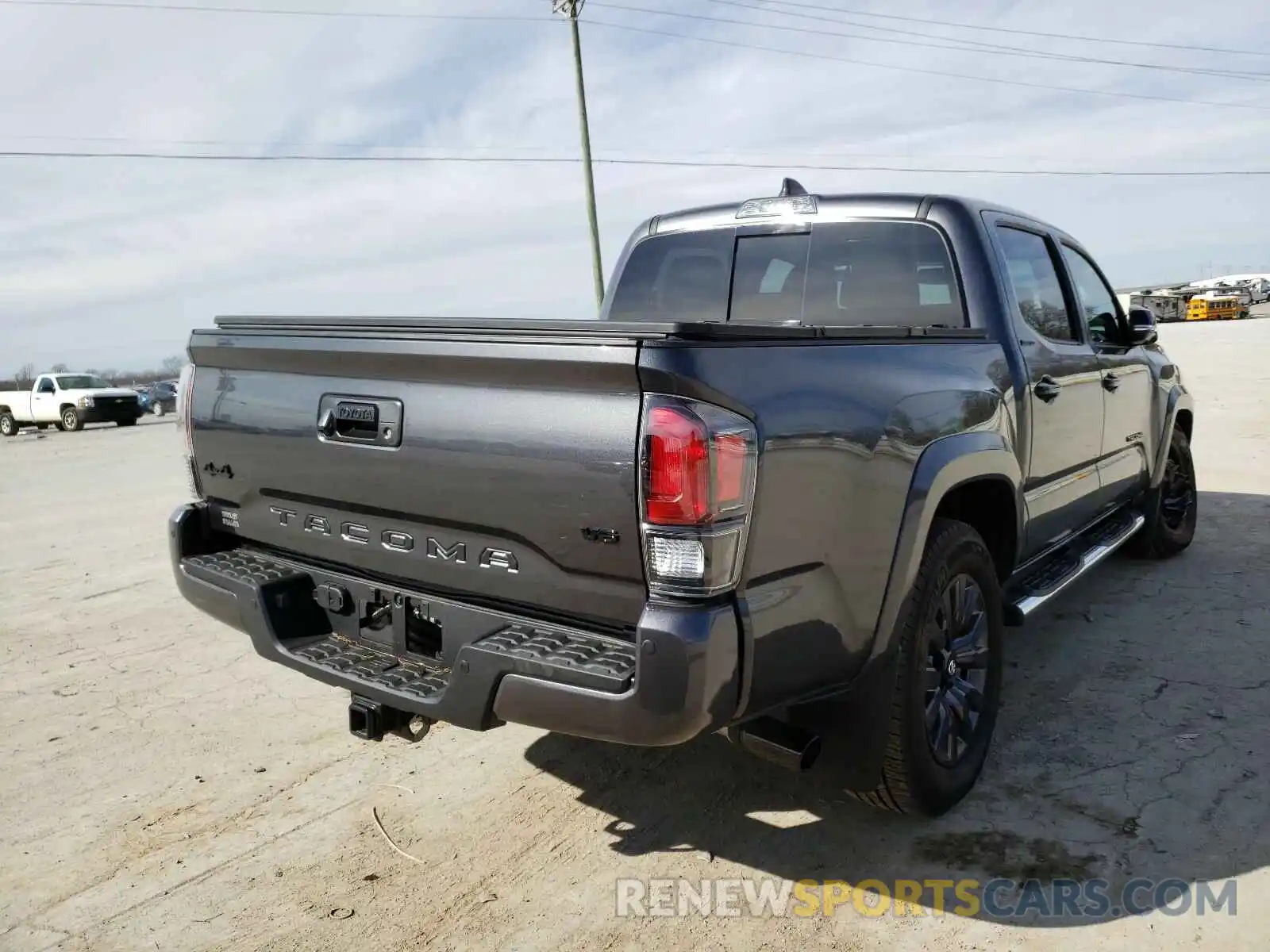 4 Photograph of a damaged car 3TMGZ5AN8MM371681 TOYOTA TACOMA 2021