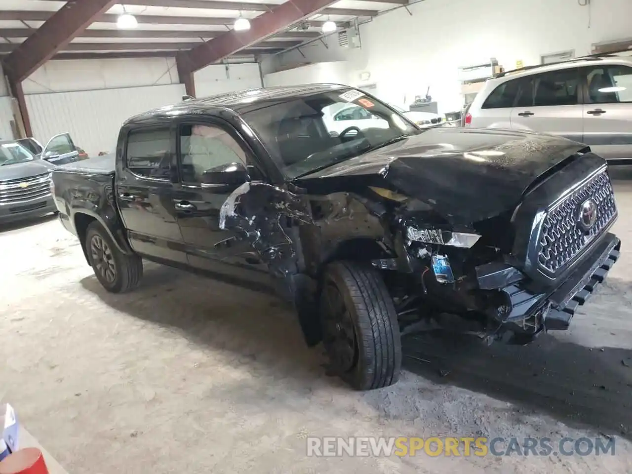 4 Photograph of a damaged car 3TMGZ5AN8MM389016 TOYOTA TACOMA 2021