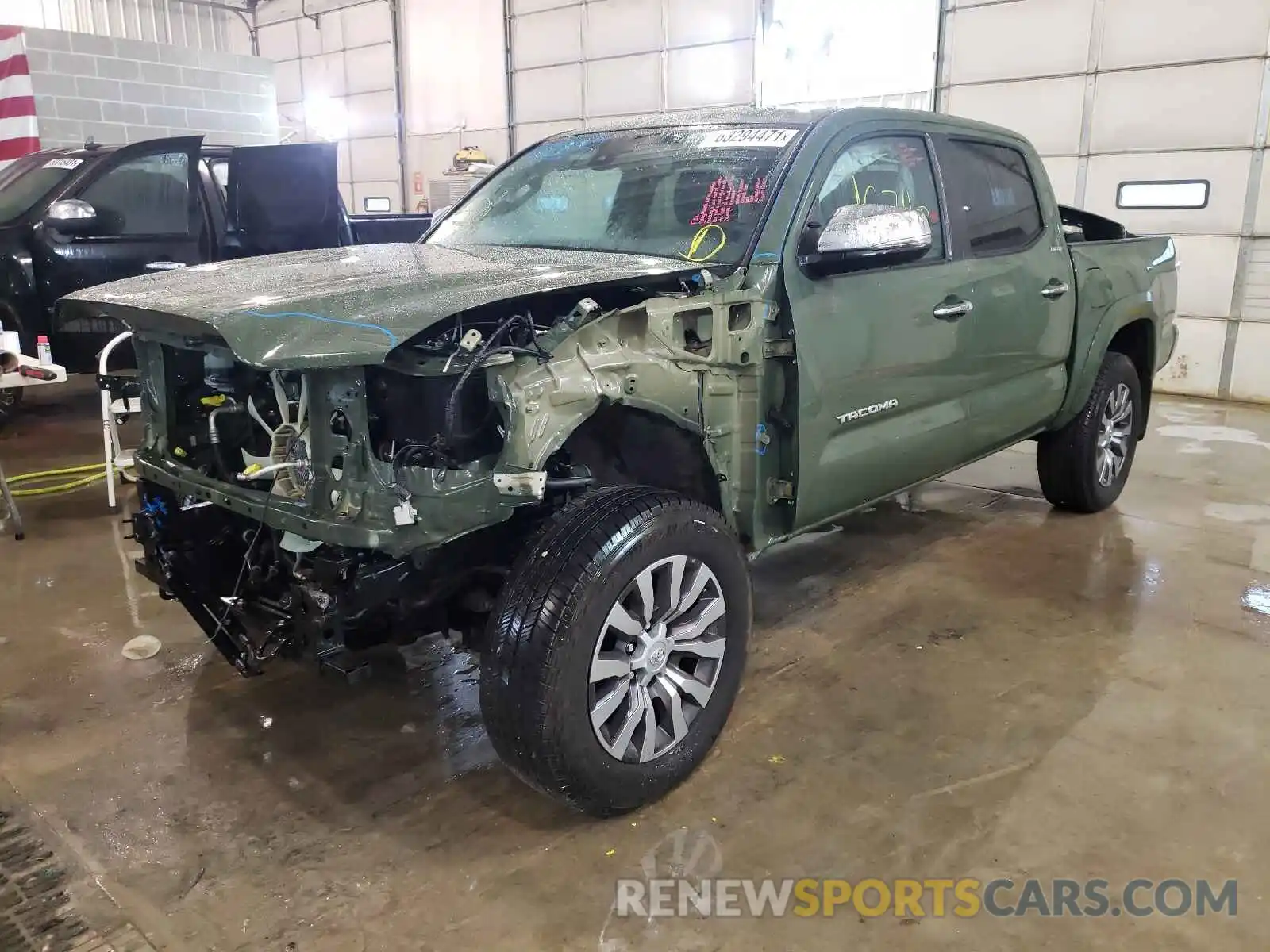 2 Photograph of a damaged car 3TMGZ5AN9MM386304 TOYOTA TACOMA 2021