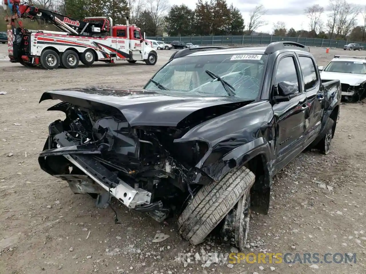 2 Photograph of a damaged car 3TMGZ5AN9MM388201 TOYOTA TACOMA 2021