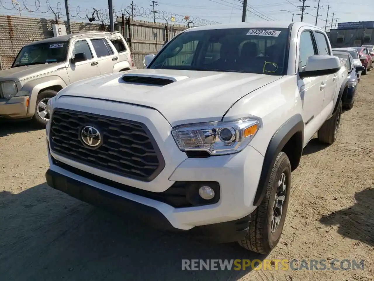 2 Photograph of a damaged car 3TYAX5GN7MT013897 TOYOTA TACOMA 2021