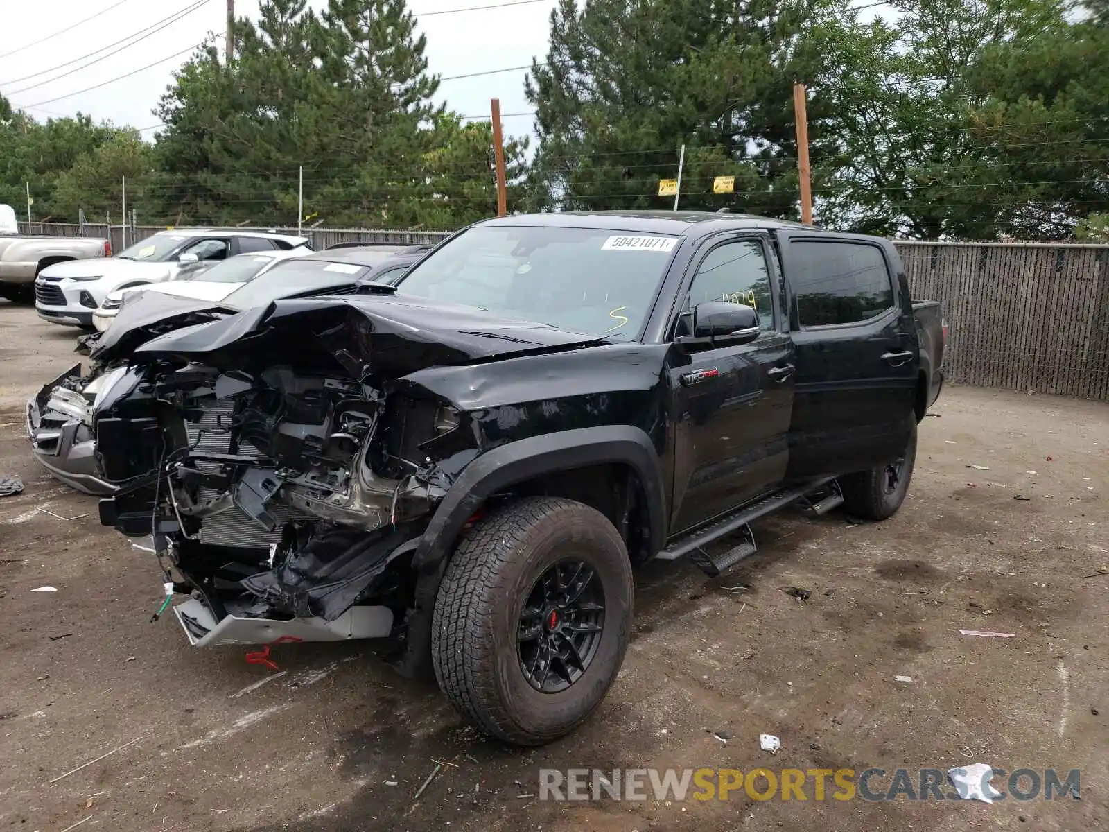 2 Photograph of a damaged car 3TYCZ5AN1MT038502 TOYOTA TACOMA 2021