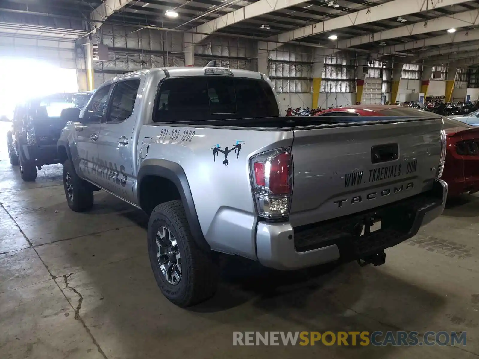 3 Photograph of a damaged car 3TYCZ5AN3MT027713 TOYOTA TACOMA 2021