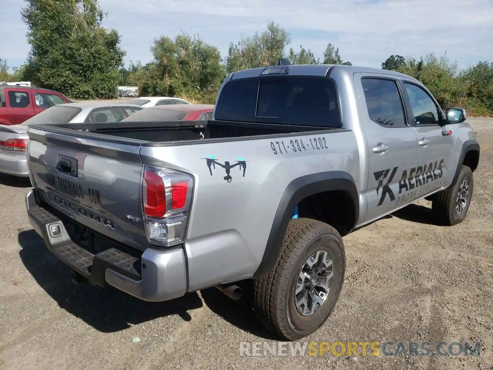 4 Photograph of a damaged car 3TYCZ5AN3MT027713 TOYOTA TACOMA 2021