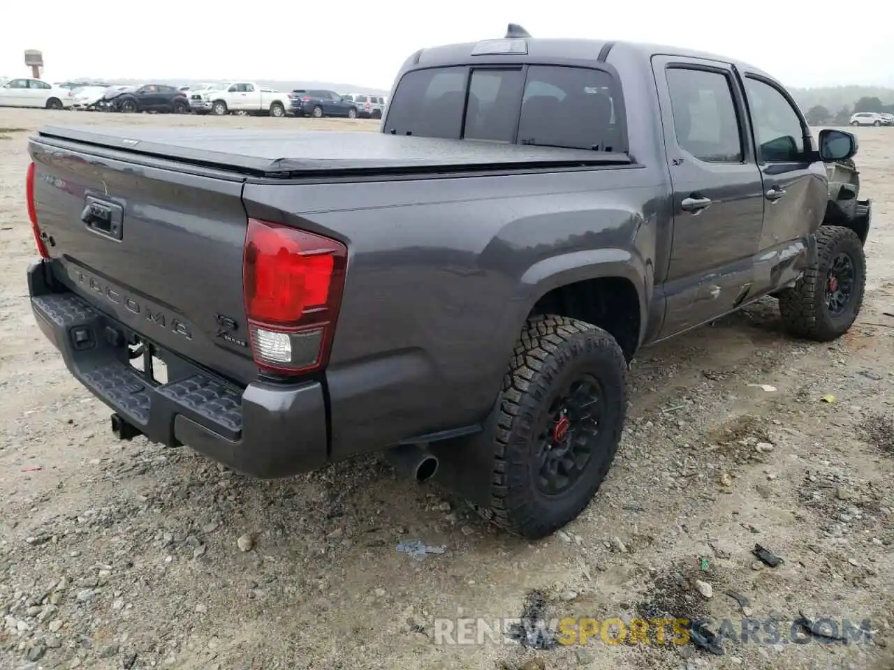 4 Photograph of a damaged car 3TYCZ5AN3MT050473 TOYOTA TACOMA 2021