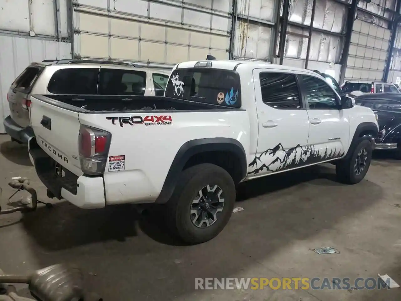 4 Photograph of a damaged car 3TYCZ5AN4MT052667 TOYOTA TACOMA 2021