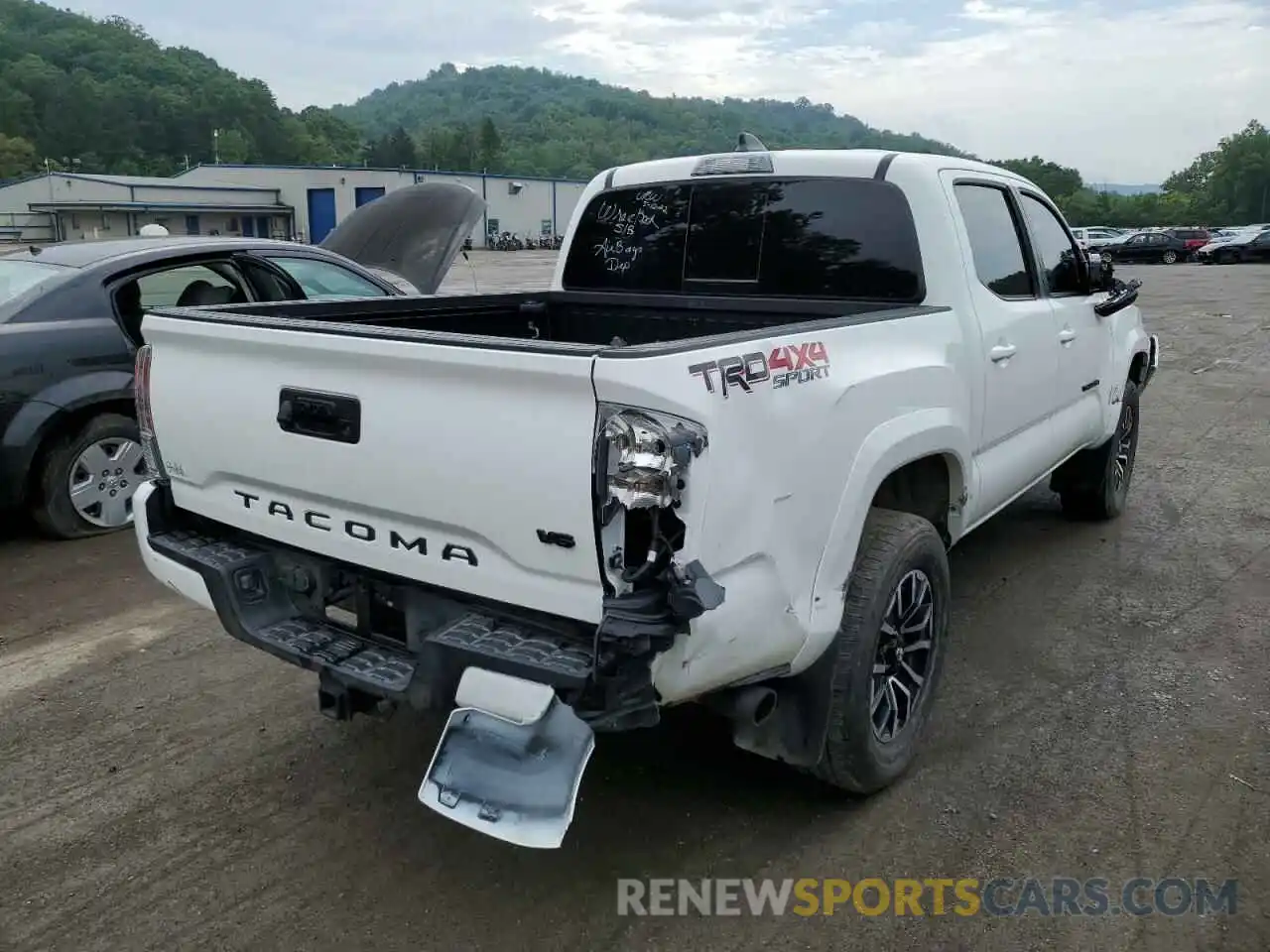 4 Photograph of a damaged car 3TYCZ5AN5MT029432 TOYOTA TACOMA 2021