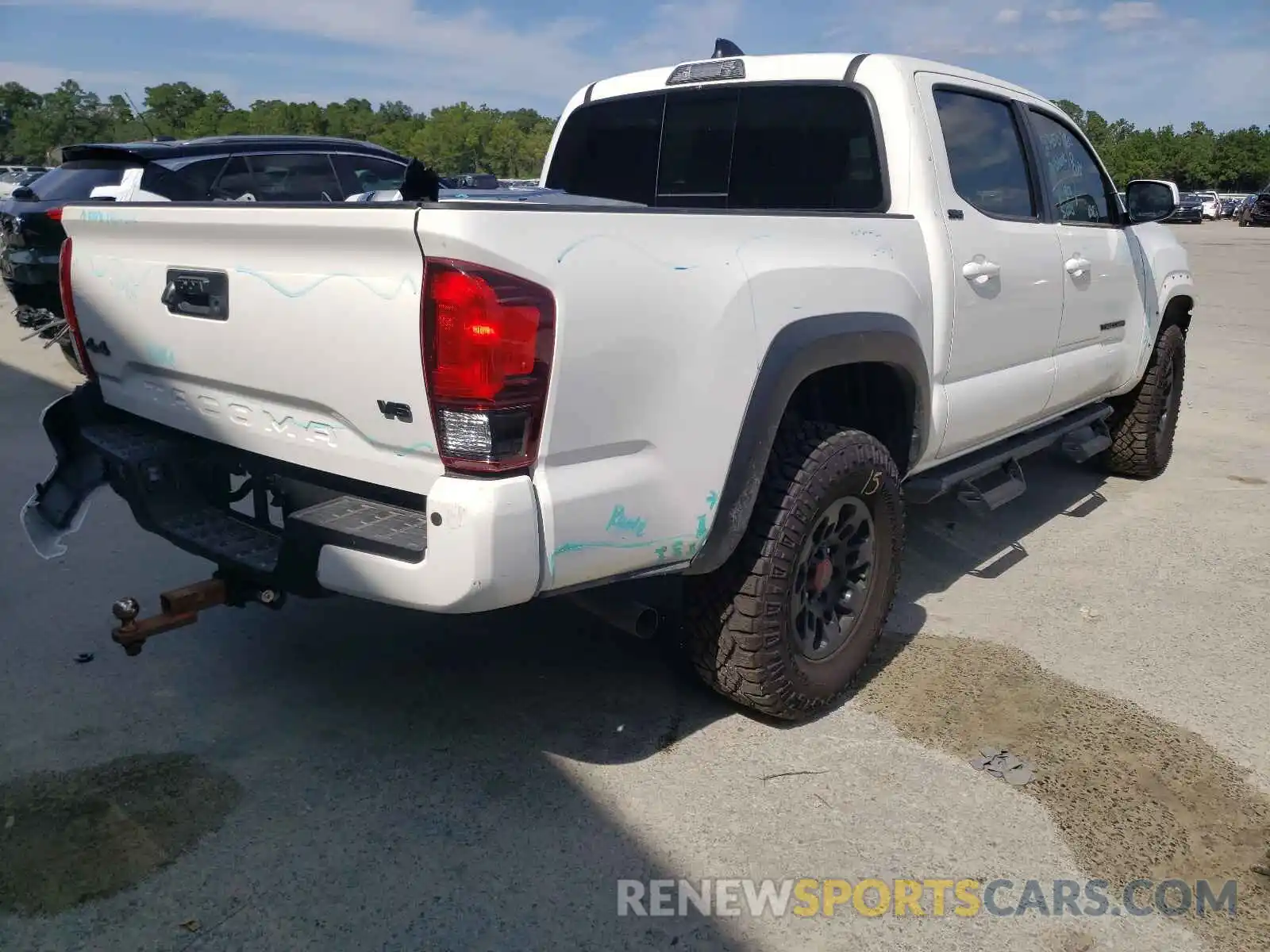 4 Photograph of a damaged car 3TYCZ5AN6MT014048 TOYOTA TACOMA 2021